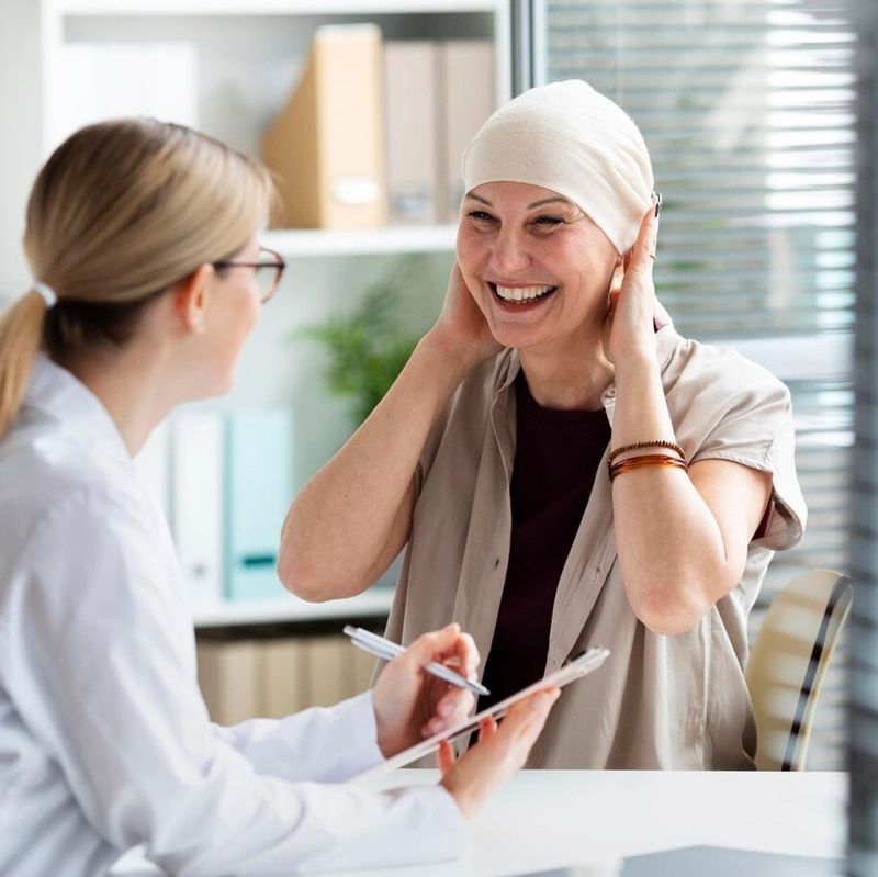 woman-with-skin-cancer-talking-with-doctor_23-2148988506