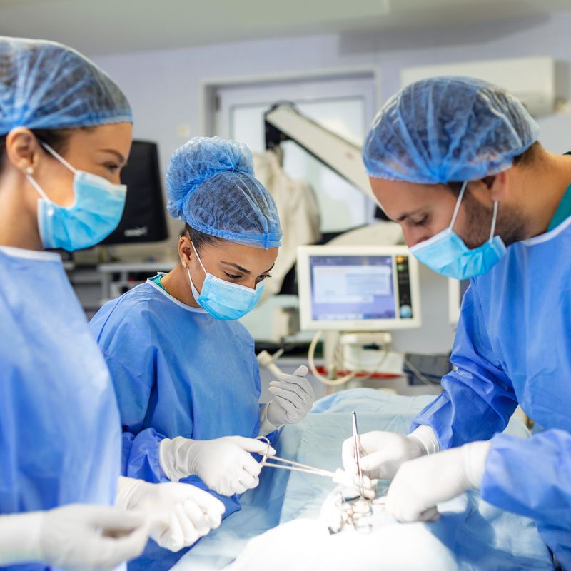 group-surgeons-doing-surgery-hospital-operating-theater-medical-team-doing-critical-operation-group-surgeons-operating-room-with-surgery-equipment-modern-medical-background